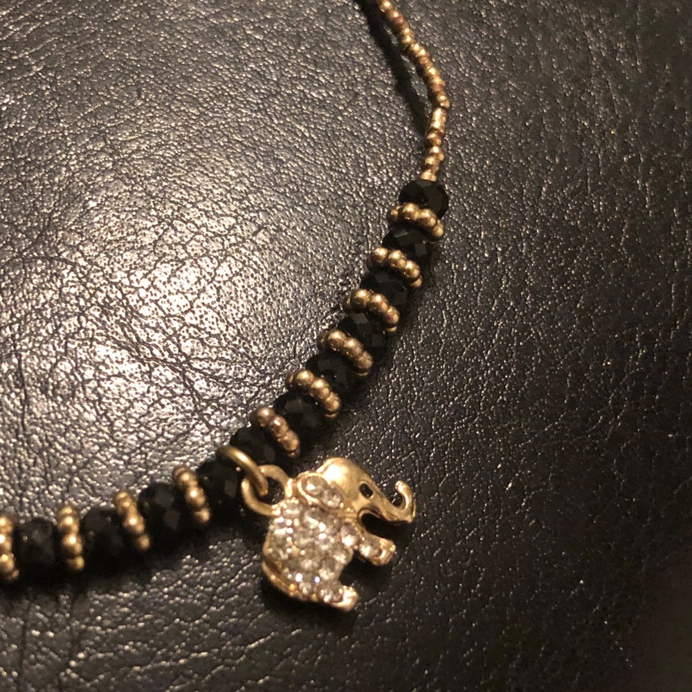 NWOT adjustable gold elephant bracelet